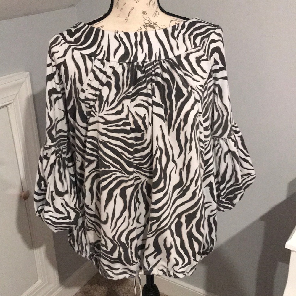 Animal print top by Andre Oliver